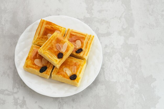 Lekker holland or dutch butter cake (boterkoek), made of butter, flour, eggs and sugar with almond