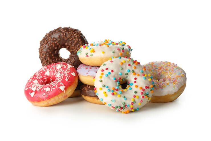 Foto lekkere gebakken donuts geïsoleerd op een witte achtergrond
