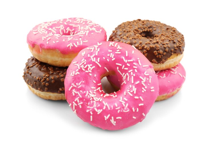 Foto lekkere geglazuurde donuts geïsoleerd op wit