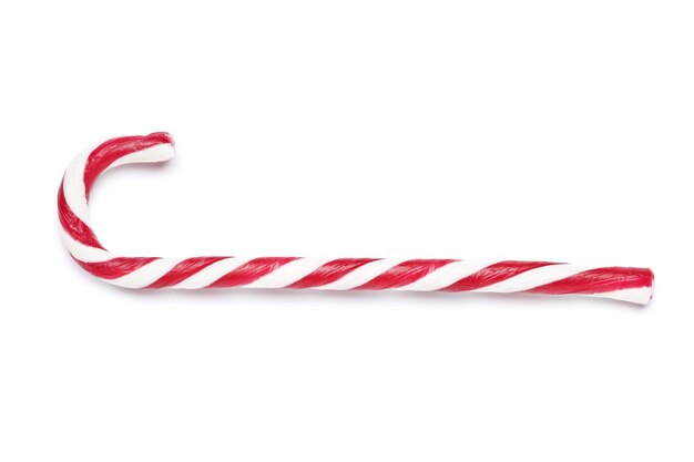 Lekkere rode candy cane op witte achtergrond. feestelijke traktatie