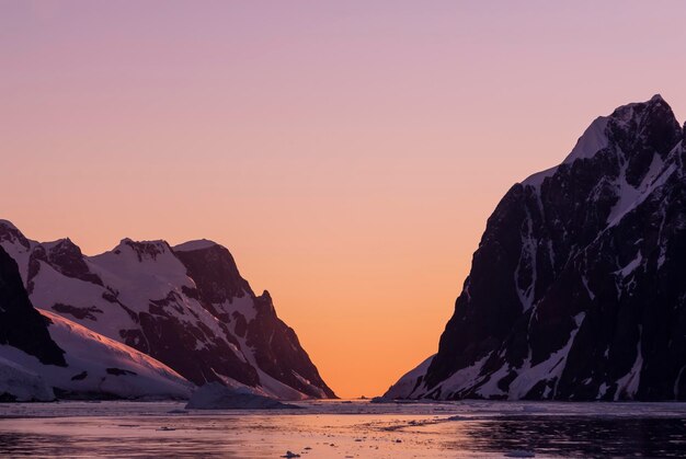 Lemaire strait coastal landscape mountains and icebergs Antarctic Peninsula Antartica