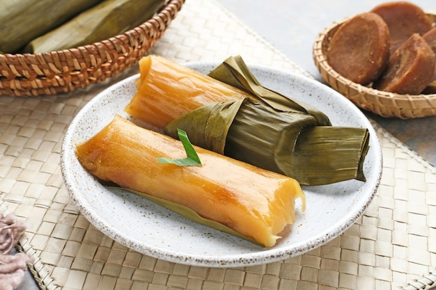 Lemet Singkong Utri or Ketimus is a traditional cake made from grated cassava with brown sugar