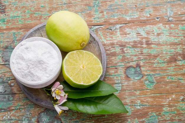 Lemon and baking soda on the table