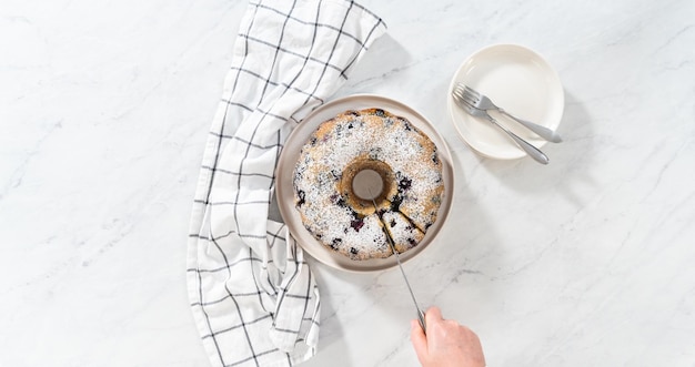 Lemon blueberry bundt cake with powdered sugar dusting