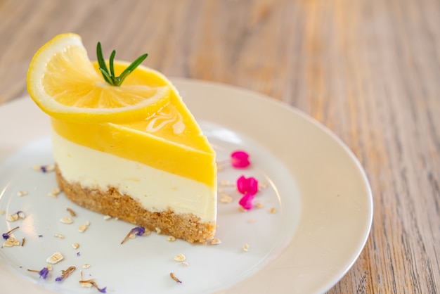 lemon cheese cake on plate in cafe and restaurant