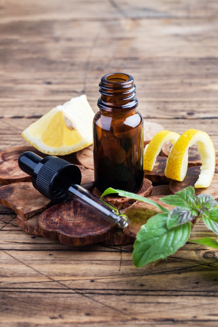 Photo lemon citrus fruit essential oil and mint,