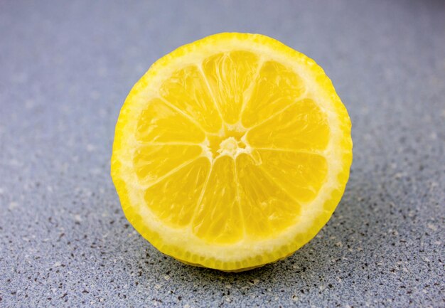 Lemon closeup on a blue table Lemon yellow natural