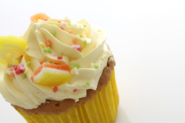 Lemon cupcake isolated in white