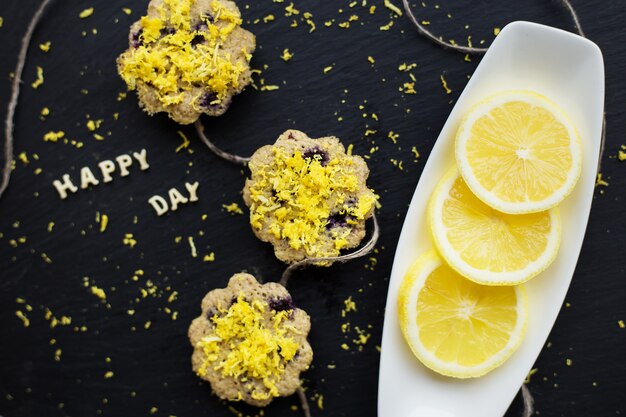 Lemon cupcakes on a black background