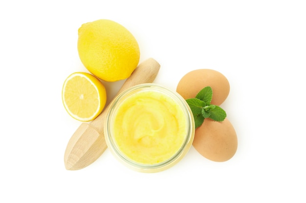 Lemon curd and ingredients isolated on white background