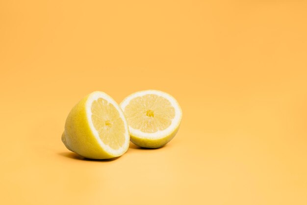 Lemon fruit on colored background