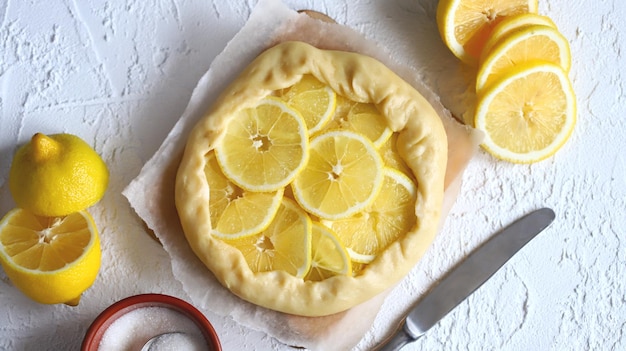 Lemon galette before baking. Preparing a galette with lemon.