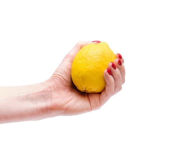 Lemon in hand isolated Citrus fruit