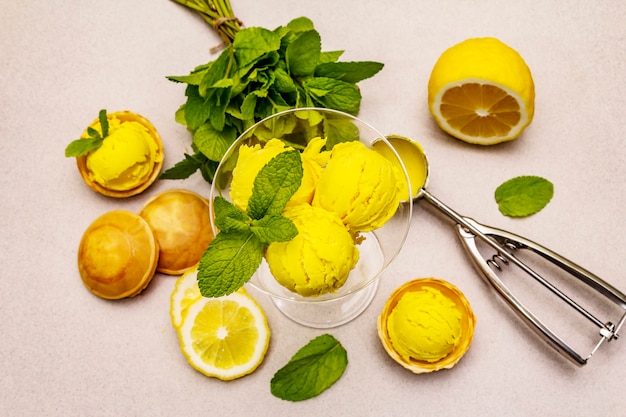 Lemon ice cream with mint in a glass