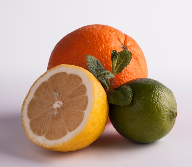 Lemon, lime and orange - citrus fruits isolated on white background