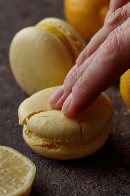 Lemon macaroons on a dark background