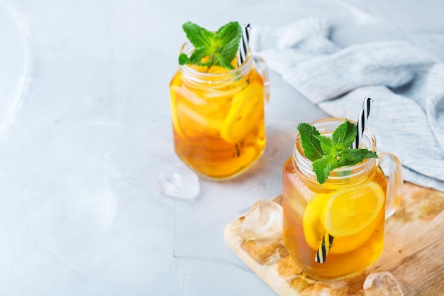 Lemon mint iced tea cocktail refreshing drink for summer days