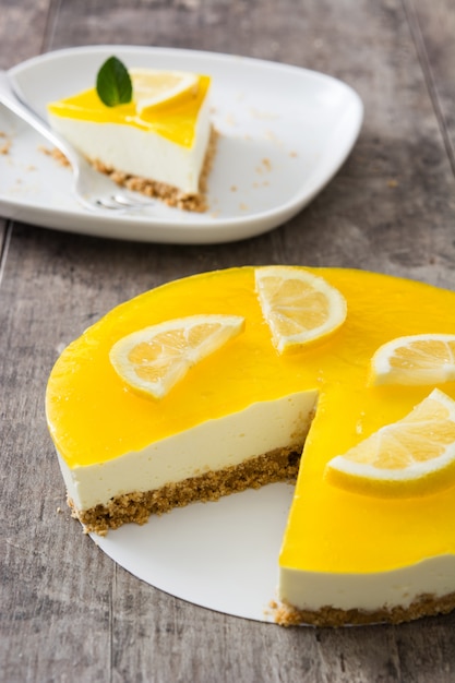 Lemon pie on wooden surface