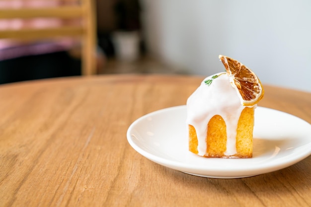 Lemon pound cake on white plate