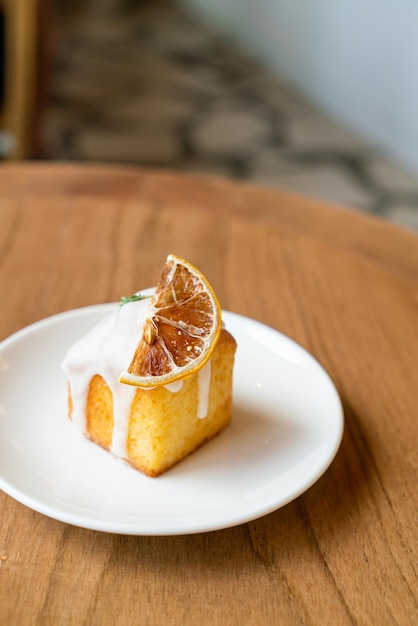 Lemon pound cake on white plate