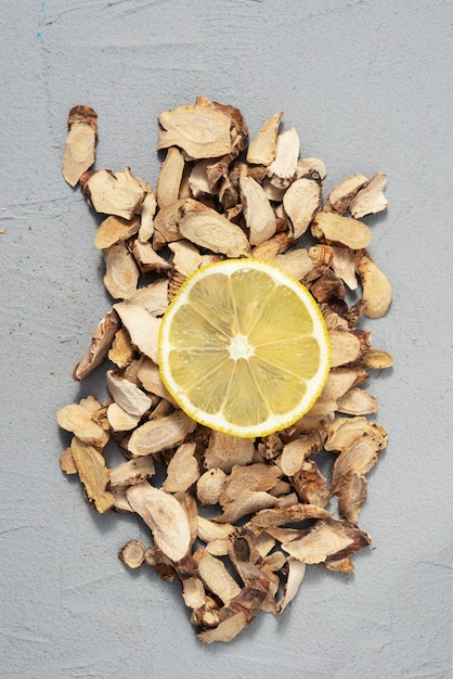 Lemon slice on organic wood bark background