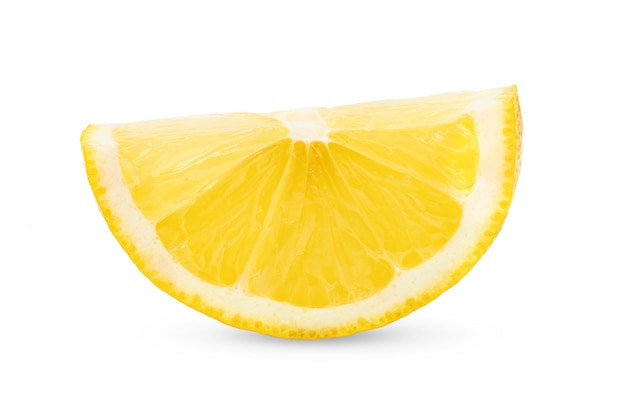 Photo lemon slice on white wall