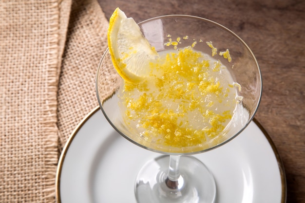 Lemon sorbet on a wood background