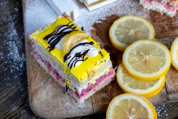 Lemon strawberry cake made of several layers of cakes of different flavors