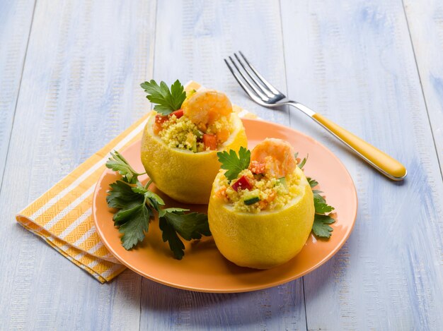 Lemon stuffed with shrimp and couscous