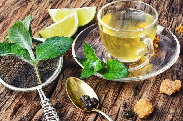 Lemon tea on wood background