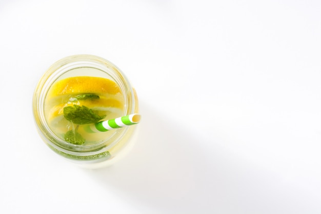 Lemonade drink in a jar glass isolated on white top view