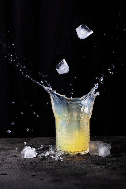 Lemonade juice levitation photo with splashes and drops