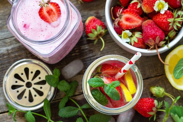 Lemonade with fresh strawberries and Strawberry fruit Yogurt smoothie or milk shake Top view