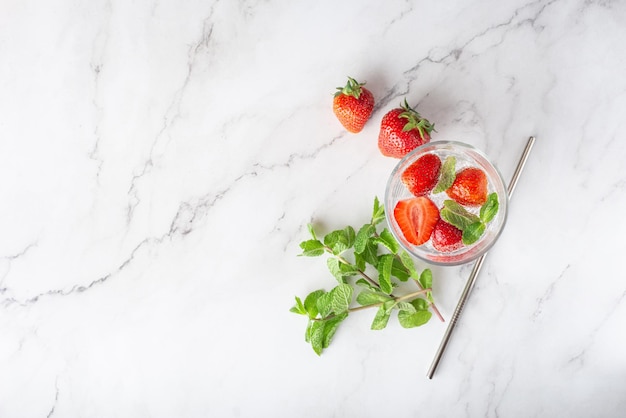 Lemonade with strawberries and mint and ice