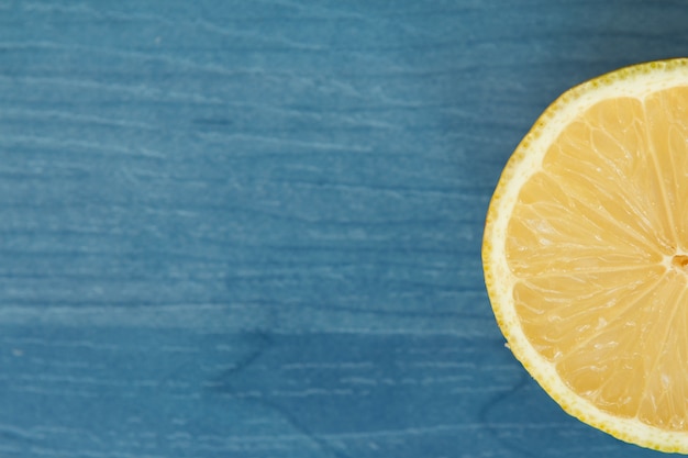 Lemons on a blue wooden table 