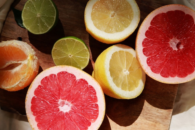 Lemons grapefruit and limes cut in half