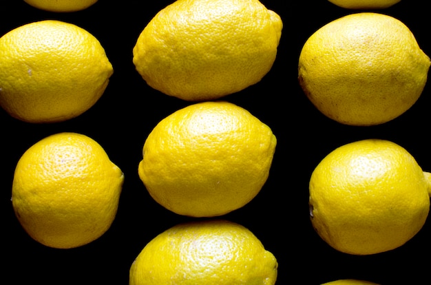 Lemons isolated on black