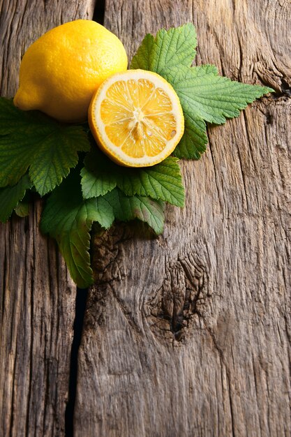 Lemons. On a wooden board.