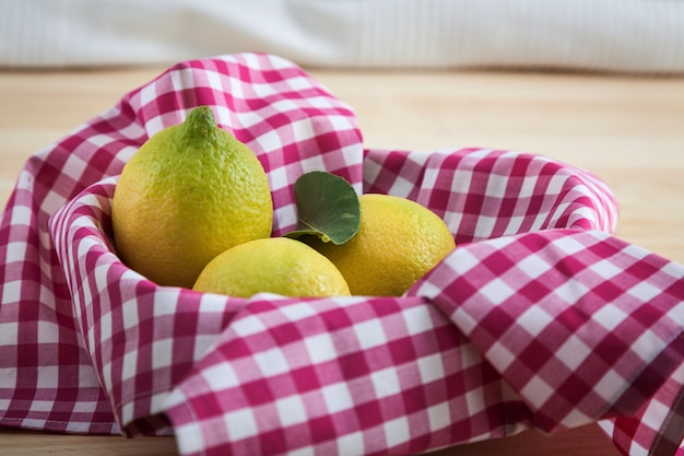 Lemons on wooden table