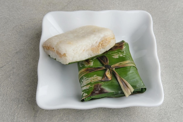 Lemper is an Indonesian savoury snack made of glutinous rice filled with seasoned shredded chicken