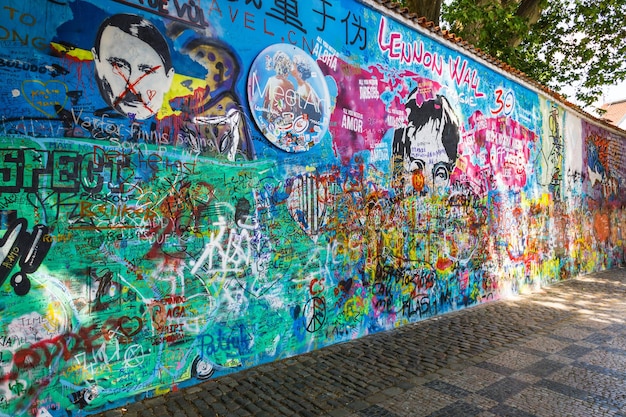 Lennon Wall Graffiti covered wall inspired by Lennon in the Prague Czech Republic