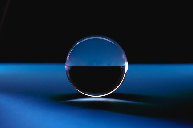 Lens ball on black and blue background