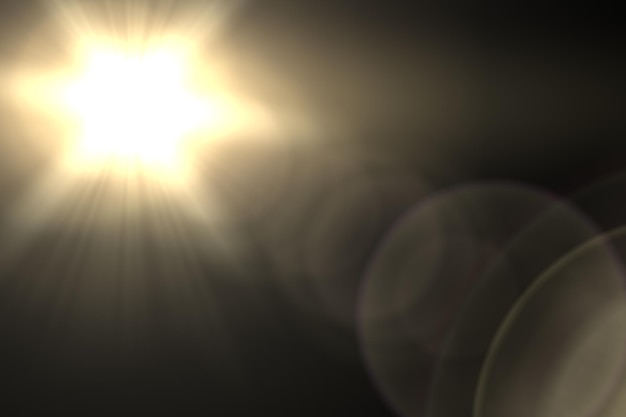 Foto lens flare sun flare op zwarte achtergrond lens flare gloed lichteffect op zwarte achtergrond voor het toevoegen van overlay of schermfilter over foto's oranjegele lichtstralen