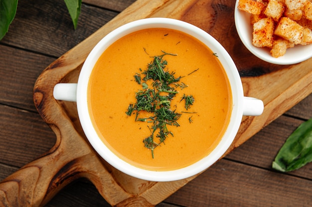 Lentil cream soup with dill and croutons