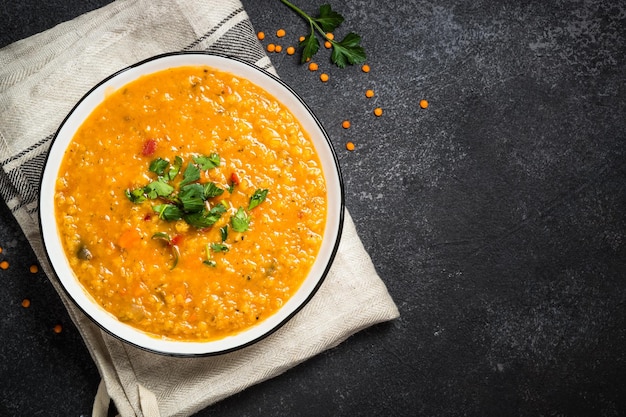 lentil soup on black stone table traditional turkish or arabic vegetable soup top view with copy space
