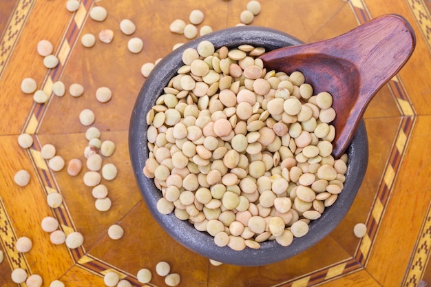 Lentils in bowl on the table Lens culinaris