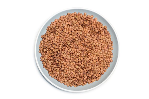 Lentils on a gray plate on a white background