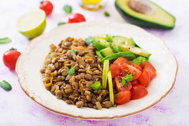 Lentils porridge and fresh vegetables