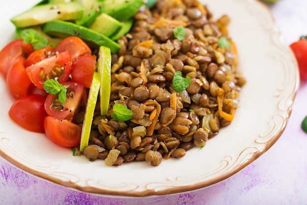 Lentils porridge and fresh vegetables