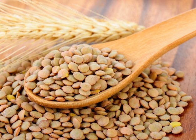 Lentils in wood spoon